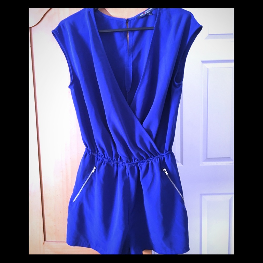 Bright blue jumper.